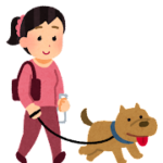 犬を散歩している飼い主